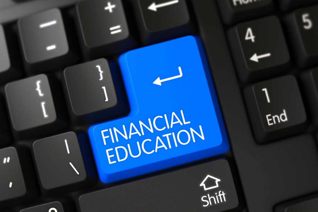 Financial Education on Computer Keyboard Background.